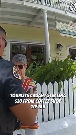 Caught on camera: A tourist in Key West reaches into a coffee shop’s tip jar and steals about $20 while paying for her order.When employees at The Funky Rooster Coffee House confronted her and called the police, officers quickly tracked her down on Duval Street. Bodycam footage shows the woman (a 63-year-old from New Jersey) denying it even after being shown the surveillance video — claiming she might have just “bumped” the jar.She was arrested for misdemeanor petty theft, released on a $1,000 b
