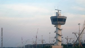 Air traffic control tower (atc) with radar is working on the top of the tower