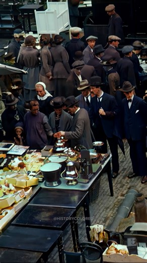 Restored footage from 1924 of a crowd of people looking at stalls at a market in Zwolle, Netherlands. Footage frame rate increased, upscaled and “colorized” by HistoryColored using AI technology. Footage originally from: Stadsgezichten van Zwolle, OpenBeelden, Public Domain Music: Equus / S.A. Karl / Epidemic Sound #history #zwolle #netherlands #historicalfootage | History in Color