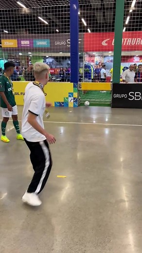 Indoor Soccer Action: Young Players Showcase Skills