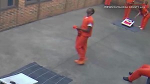 Watch a drone drop drugs into a jail
