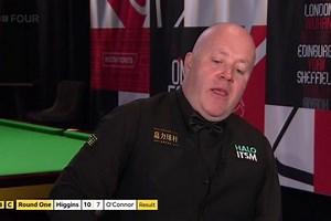 Snooker champion John Higgins comforted by BBC presenter after bursting into tears during live interview