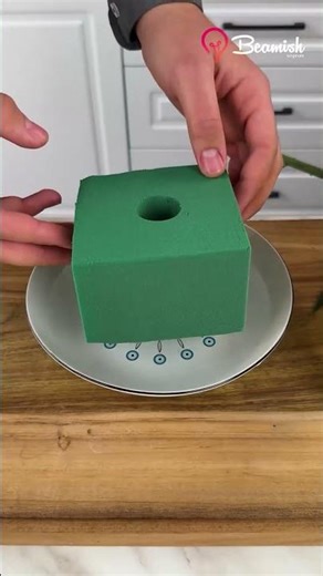 Turn a wine bottle into a floral gift surprise 🌸🍾 #creative #floral #gift #christmasvibes