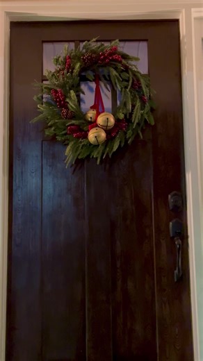The viral My Texas House Christmas Trees with the wreath and bells I also got at Walmart.. the rugs too! My doormat is sold out but I linked the layering rug and some similar doormats. May add a few more things but I kind of like the simplicity of it all. 🎄❣️ | Natasha’s Southern Flavor