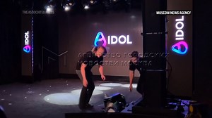 1.5M views · 12K reactions | One of the first humanoid robots in Russia collapsed on stage as it was presented in Moscow on Tuesday. The anthropomorphic robot, known as AIDOL, fell soon after walking onto the stage and staff rushed to shield it from journalists and guests with black curtains. | AP | Facebook