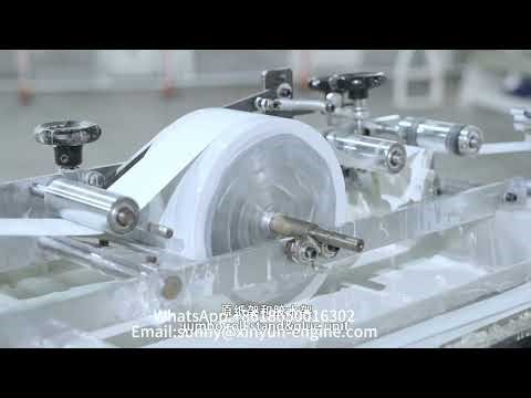 China advanced non stop toilet tissue paper / kitchen towel roll machine production line