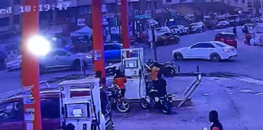 Watch the moment a motor rider's phone use triggers fire at fuel station