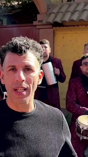 Brass Band Performance in Maroon Suits