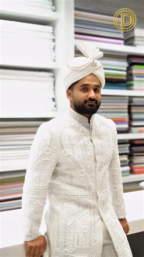 DELUXE COLLECTION on Instagram: "Pure elegance in every thread A timeless white sherwani with intricate white-on-white handwork. Description: This full white sherwani is a masterpiece of subtle luxury, featuring detailed white hand embroidery crafted with precision and finesse. The tone-on-tone handwork enhances the richness while maintaining a clean, royal aesthetic. Perfect for grooms and special occasions, this sherwani defines sophistication, grace, and timeless style. #deluxecollection #del