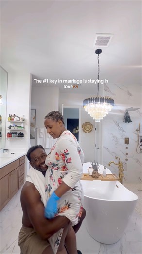 This is what our morning looked like before the kids start calling our names. It’s funny, it’s intimate, and it’s ours.🫶🏾 And I’m sharing it because I know there are marriages out there hanging on by routine… surviving, but not really loving. There’s a difference between loving your spouse and being in love with your spouse. Loving is the feeling. Being in love is the commitment. The commitment to show up, to nurture, to create softness, to fight for connection, to choose affection on a random