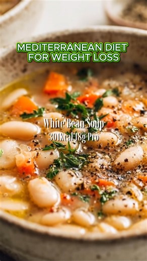 Mediterranean Diet Plan 🇺🇸 on Instagram: "🍲 White Bean Soup – simple, warm, and Mediterranean-style This soup looks light, clean, and nourishing. White beans, olive oil, vegetables, herbs — everything “healthy” on paper. But here’s something I learned the hard way 👇 Even a meal like this can feel very different from one person to another. Some people feel: – Light and satisfied – Warm, calm digestion Others feel: – Bloated – Heavy – Or tired after eating Same soup. Different bodies. Because 