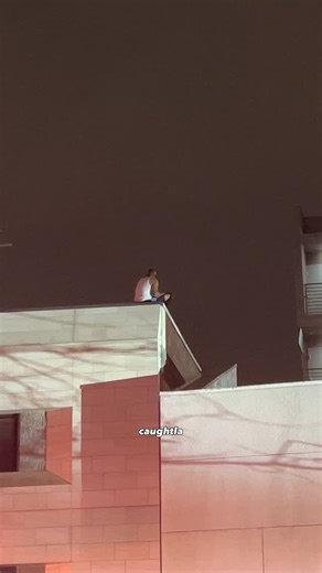 Caught LA on Instagram: "A man was found sitting on the edge of a 3 story building at 647 E 6th St in the Slid Row area of downtown Los Angeles. LAFD & LAPD responded. First responders were able to talk the man into climbing down. No injuries were reported. The patient was transported. • • #medical #firefighters #caughtla #viral #breakingnews"