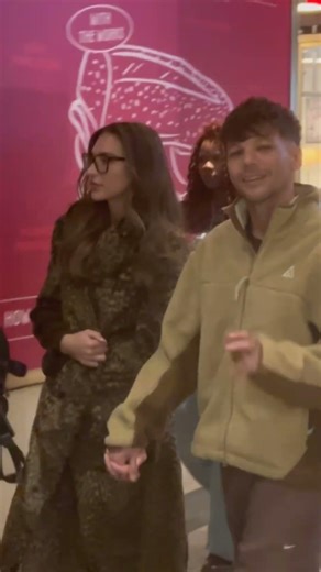 Louis Tomlinson arriving at rough trade record store in New York City