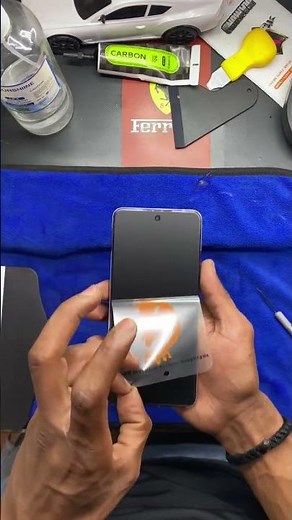 Applying matte gaming screen protector for smooth touch and anti-glare experience 🎮✨