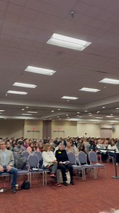 Big crowd at today’s naturalization ceremony. Chorus singing national anthem and God Bless America. Always a joy and a privilege. | Bill Biffle