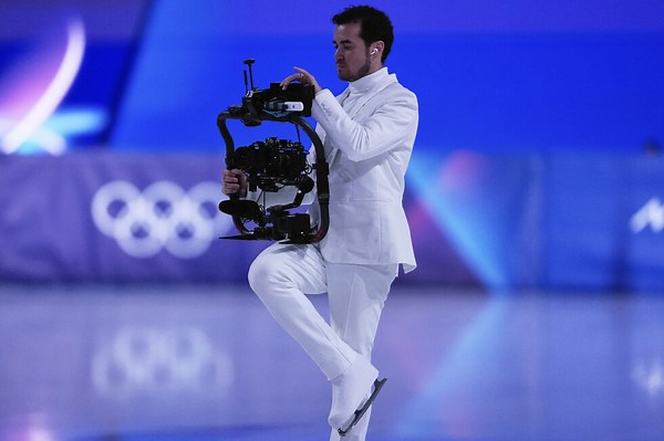 The cameraman who skates backward to capture Olympic triumph and defeat