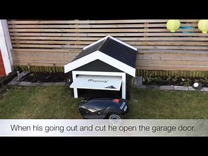 Robotic mower with automatic garage door.