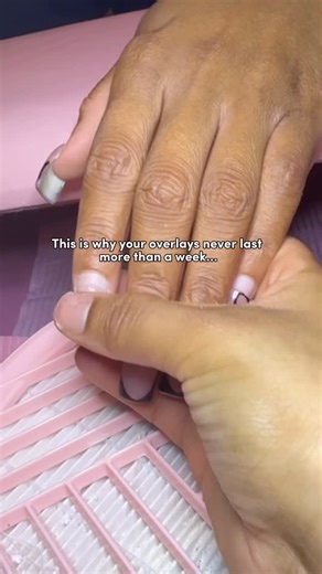 HOUSTON NAIL TECH | EDUCATOR on Instagram: "Most overlays lift because of one thing: skipping proper nail prep! 😬💅🏽 That means filing, dehydrating, double priming and properly applying product evenly so it adheres perfectly to the natural nail. Miss one step, and your client’s nails start lifting in days. Do it right → retention for WEEKS. This overlay lasted 2 months🔥 If you’re tired of struggling to figure things out run to the link in my BIO & sign up for your class! #htxnailtech #acrylic