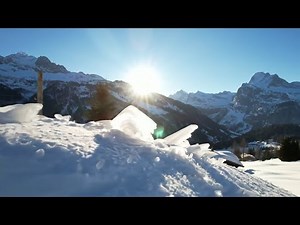 Majestic Swiss Alps in Winter – Snow-Covered Peaks and Alpine Villages in 4K
