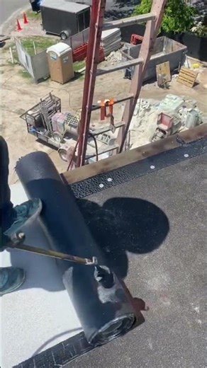 Laying down torch-applied modified bitumen