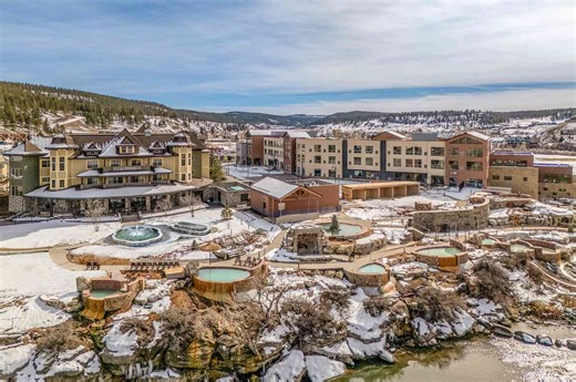 This Colorado Resort Just Added 25 Outdoor Riverfront Pools and a Panoramic Sauna With Rocky Mountain Views—and It Sources Water From the Deepest Hot Spring in the World