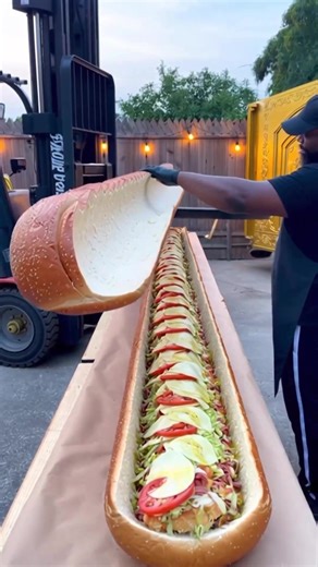 GIANT Chopped Italian Sub 🥖🔥 Massive sandwich Loaded with deli meats Chopped Italian style Would you try it? #cookingwithstrong #italiansub #giantsandwich #foodtok