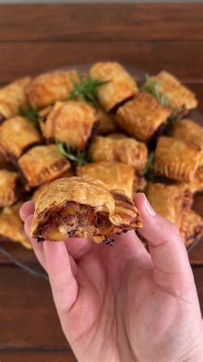 Pork, bacon, cranberry and Brie sausage rolls Ingredients: 500g pork sausage mince 1 egg 1 & 1/2 cups Panko crumbs 1 tbsp Vegeta seasoning 1 tsp black pepper 6 cloves of garlic finely minced 1 tbsp Dijon mustard 300g bacon chopped crispy bacon 200g cranberry sauce 250g sliced Brie To assemble: 6 sheets Puff pastry 1 Egg Sesame seeds Method: 1. Preheat oven to 180 degrees Celsius fan forced 2. In a mixing bowl use your hands to combine pork sausage mince, bread crumbs, egg, Vegeta, pepper, garlic