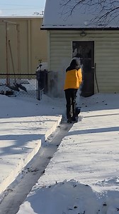 My son being super helpful by plowing the walkway, yesterday, so we could get to the trashcan. And he was having fun using the plow too! | Jennifer Wood