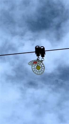 Weird Objects Hanging From Power Lines — What Are They?
