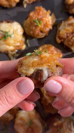 These stuffed mushrooms pack the rich, savory flavors of French onion soup with melted Gruyère on top into a bite-size appetizer. Follow the link in the comments to view the recipe—then click the heart icon on the recipe page to save it.🩷 | EatingWell