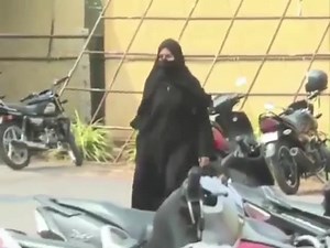 Allah grant her Relief, Honour, and the company of the righteous. She is a Daughter of Prophet Dawood in her composure, sacrifice & enduring patience and battle against Evil. A single Muslimah defeated through her determination a 100 inept cowardly boys. Allah establish her, make her claim righteous, and plant for her love in the hearts of our Ummah and beyond. Allah shower Sabr upon her and make her stance stable. I do not know her name but the angels celebrate it in the heavens, inshaa'Allah! 