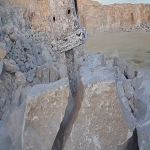 Hydraulic hammer breaking stone slow-motion | Survival skills