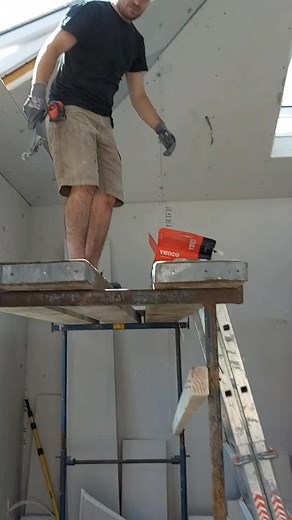 Construction Work: Power Drill Techniques in Action