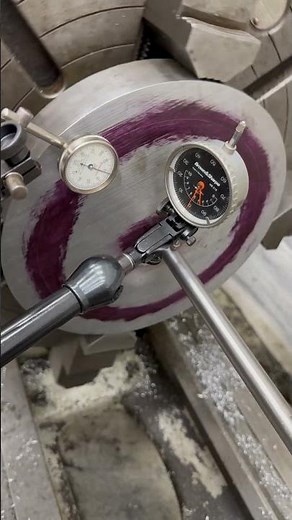 Dual dial indicator setup to get a plate true in the lathe. #machineshoplife