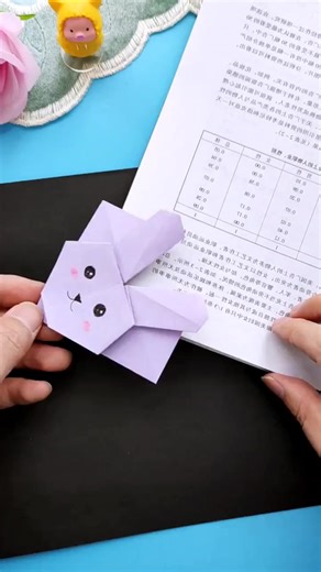 Title: "Hop into Reading: Craft a Cute Bunny Bookmark with Paper Folding Fun! 🐰📚" Hashtags: - #BunnyBookmark - #ParentChildCraft - #HandmadeDIY - #OrigamiTutorial - #RabbitOrigami - #PaperRabbit - #CreativeReading - #DIYBookmarks - #CraftyParenting - #OrigamiFun | paper craft ideas