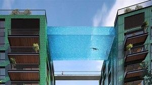 Large transparent pool connecting downtown buildings ready to open