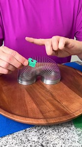 My new favorite kitchen hack using a bread tie and a Slinky toy. | The Gooch