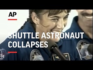 Shuttle astronaut collapses during welcome home ceremony