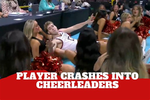 Basketball player crashes into cheerleaders in chaotic courtside moment