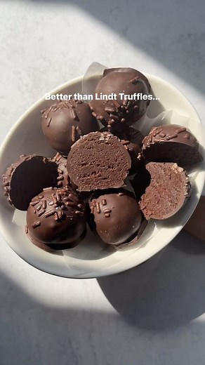Krista Nastu | Akashic Records & Spirituality on Instagram: "Vegan Chocolate Truffles are easy to make, chocolatey and so delicious! They are the perfect healthy no bake dessert. Comment “recipe” and I’ll DM you the link! 💛 #veganchocolate #chocolatetruffles #nobake #vegan"
