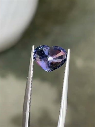 Natural violet-green spinel, 2.78ct, 9.8*7.6*5.8mm, 23 million VND.