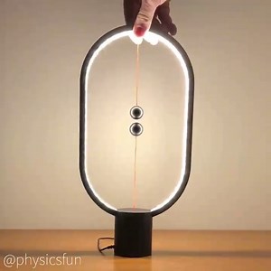 physicsfun on Instagram: "Heng Balance Lamp: magnetic suspension sculpture and light- with two embedded neodymium magnets on cords suspended by their mutual magnetic attraction. In this design by Zanwen Li, the bottom cord engages the light switch. ➡️ Follow the link in my profile for info on where to buy this lamp and other amazing items featured here on @physicsfun #magnets #physicsfun #magneticfield #magneticforce #kineticart #magneticsculpture #physics #physicstoy #equilibrium #science #neod