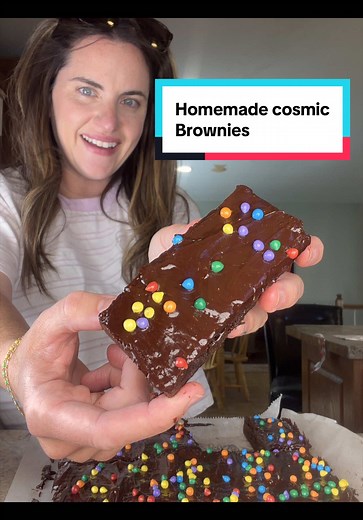 Cosmic brownies! A recipe from Audrey Bakes! @audreybakes Ingredients: 10 tbsp unsalted melted butter 1 cup granulated sugar 1/3 cup packed dark brown sugar 2 eggs 1 yolk 1 tsp vanilla 2/3 cup cocoa powder unsweetened 1/2 tsp salt 1 tbsp corn starch 3/4 all purpose flour Ganache: 3/4 cups semi sweet chocolate chips 1/4 cup heavy cream Rainbow candy sprinkles How to: Grease 8 x 8 baking pan and line it with parchment paper. In a bowl, combined melted butter, granulated sugar, and brown sugar. Mix