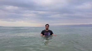 Floating in the Dead Sea was the most surreal experience of my life. The Dead Sea is the lowest point on Earth around 400 meters below sea level. It is a unique water reservoir since it carries 9.6 times more salt than a regular sea. One liter of water from the Dead Sea contains 300grams of salt; that's too much salt. Due to high salt content it's density increases due to which human beings float on top of it like the way I am doing and enjoying here. It is known as the Dead Sea since no flora f