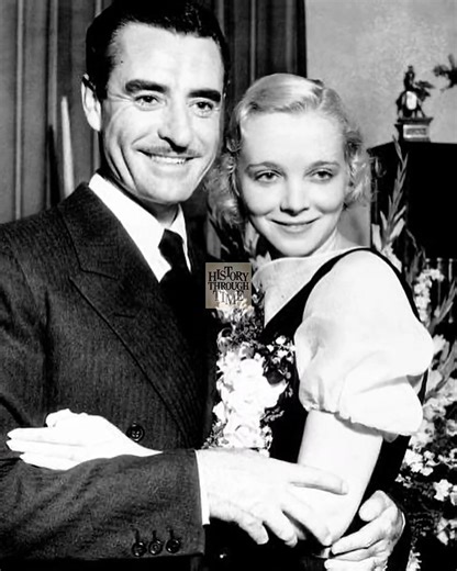 "Actors John Gilbert and Virginia Bruce were photographed on their wedding day in 1932 at the MGM studio lot in Culver City, California—a fitting location for two rising stars of the silver screen. Gilbert, once hailed as 'The Great Lover' of silent films, had reached legendary status by the late 1920s, while Bruce, a radiant new talent, was gaining recognition for her poised performances in early talkies. Their wedding, held amidst the bustling backdrop of Metro-Goldwyn-Mayer, was a blend of Ho