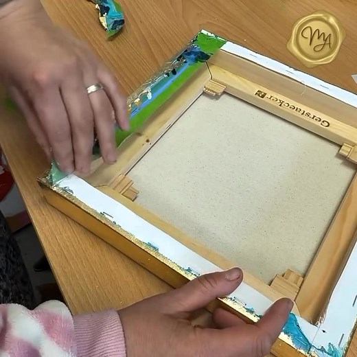 The final step on camera: removing the tape and giant push pins. This painting is finished with gold leaf and, as a final touch, my wax seal. I always get lots of questions about this part, I only add it after discussing it with the buyer. ✨ What do you think of this finish? #fluidart #abstractart #goldleaf #artprocess #artistsoninstagram #modernart #artcollector #artdetails #waxseal #artstudio #fluidpainting #marjoleinart #abstractart #art | MarjoleinART - Fantasy Artwork