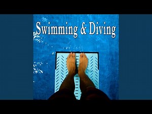 Children Playing and Swimming in an Indoor Pool