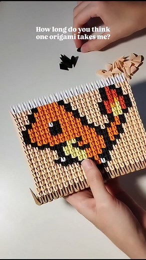 Origammies on Instagram: "Can you guess how long it takes for a single origami art piece to be made? Hint: it's more than this reel 😅 Charmander origami is still available on my Etsy shop link in Bio 🧡"
