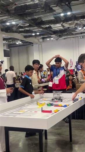 The World Robot Olympiad has kicked off in Singapore! Our teams are in action in the exciting Robomission category. Here they are testing their robots before going into the arena to compete. #WorldRobotOlympiad #WRO2025 #STEM #CCFstudents | Neeson Cripps Academy