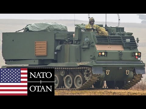 US Army, NATO. Powerful M270 MLRS Missile Systems during Combat Exercises in Germany.